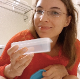 This is a brief, but nice video featuring an attractive, German girl wearing glasses taking a firm shit into a plastic container and showing her product to the camera. Presented in 720P HD. Over a minute.